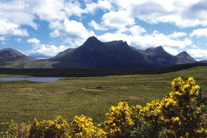 Known as the Queen of Scottish Mountains due to its distict profile, Ben Loyal rises above the Kyle of Tongue on the north coast of Scotland. The long ridge takes in three peaks and offers views of moor, mountains and sea.