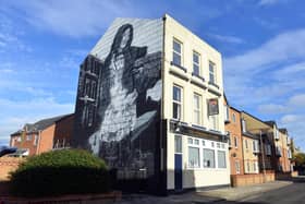 The new fishwife mural on the Fisherman's Arms by artist Lewis Hobson.