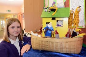 Scarlett Van Malland with the Knitted Bible's Noah's Ark when it visited Cleadon Church of England Academy last year. Picture by FRANK REID