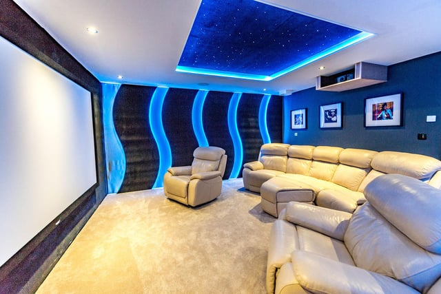 The home cinema can accommodate a projector and big screen.