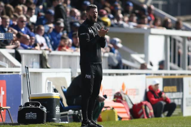 Hartlepool United assistant manager Michael Nelson shouts instructions during the League Two match with Swindon Town. (Credit: Michael Driver | MI News)