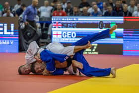 Colin Francis, 37, (white gi) in action during the tournament.