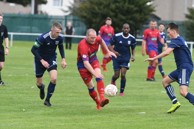FC Hartlepool (red) in action against Washington United.