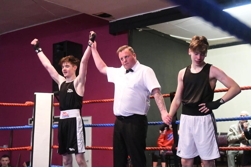 Cameron Burns (left) takes on Harrison Scott  as part of the Gus Robinson Boxing Show in 2016.