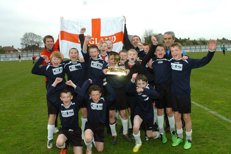We think this is the English Martyrs Year 7 football team celebrating after winning the Town Cup in 2010.