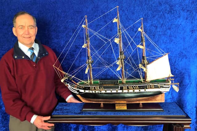 Cedric Williams with the model of HMS Trincomalee, the world's oldest floating warship, which he is offering as a charity prize in memory of his late sister.