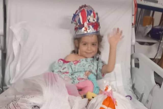 Poppy recovering in hospital following her transplant operation. Photo: Kidney Research UK