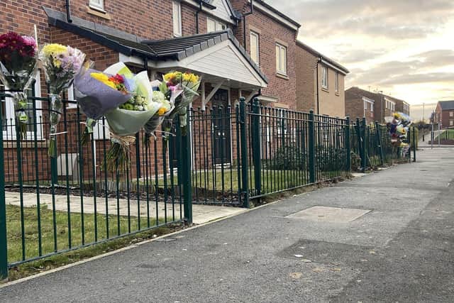 Flowers left in Raby Road following the death of Shaun Balmer.