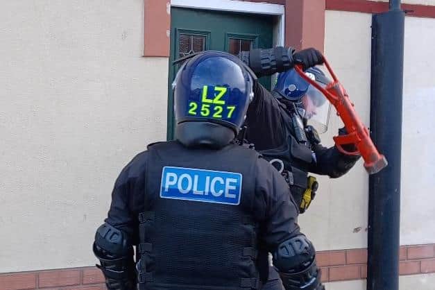 Police carry out a raid on a house in Hartlepool's Derwent Street.