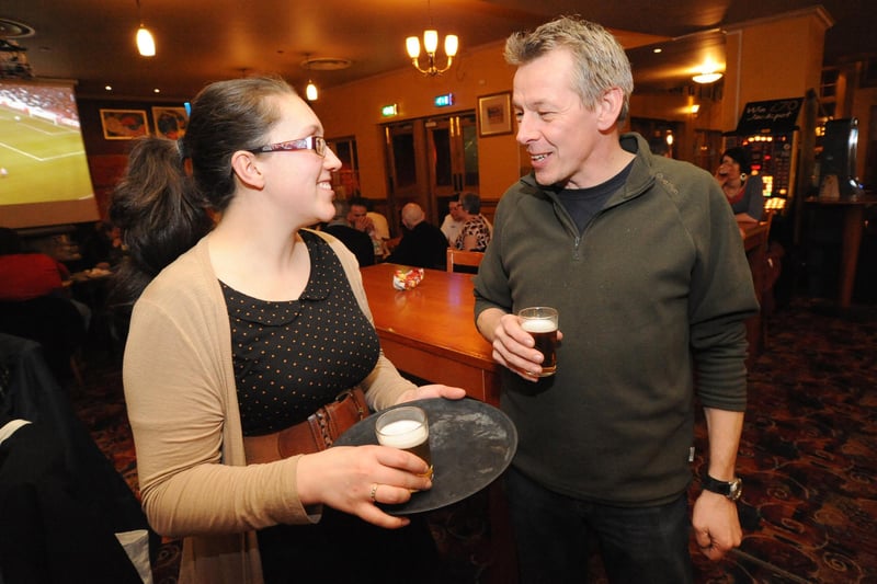 Pictured is Welbeck Abbey head brewer Claire Monk serving beer samples to punters.