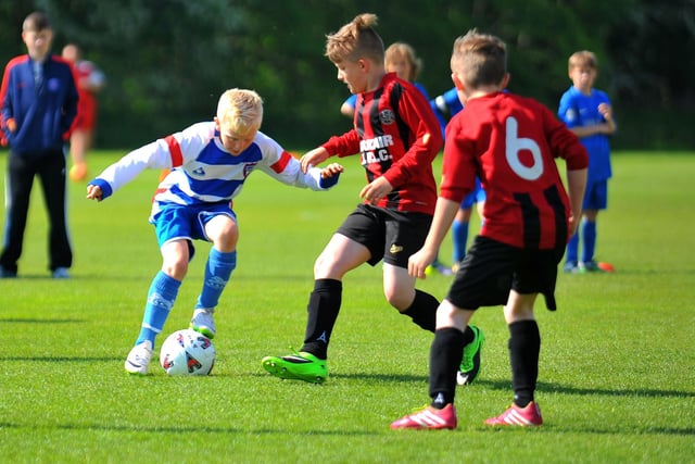 Greatham FC A (blue) v Wolsingham battle it out in the final of the TJFA Under10 Durham  Challenge Cup.