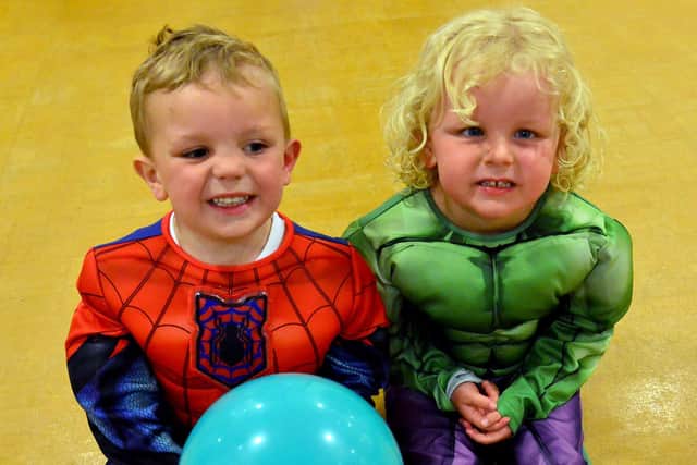 Super Hero Spiderman Hunter Tunney and Hulk Jenson Maddison pose for their photograph during a break at the Little Treasures Day Nursery's seventh birthday party.