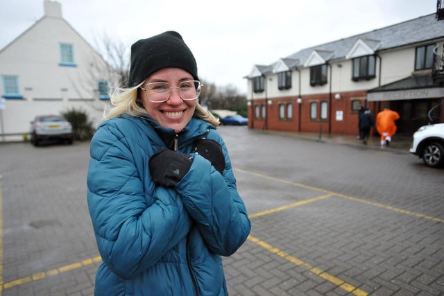 Laura Grand trying to keep warm before the Hartlepool Round Table Boxing Day Dip. Picture by FRANK REID