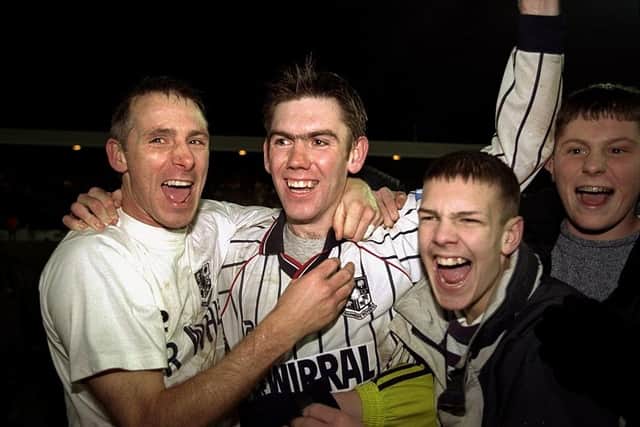 Tranmere Rovers'' David Kelly and Dave Challinor celebrate victory in the Worthington Cup semi-final second leg match against Bolton Wanderers at Prenton Park in Liverpool, England. Tranmere won 3-0 on the night to go through 4-0 on aggregate. Photo credit: Stu Forster /Allsport
