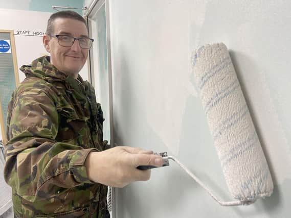 Stephen Picton decorating the kitchen of the group's office within The Arches, Park Road Hartlepool./Photo: Frank Reid