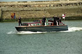 On her way - the Queen heads to Hartlepool for a 1993 visit.