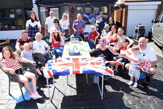 Kesteven Road residents enjoy a sun-drenched Jubilee street party.