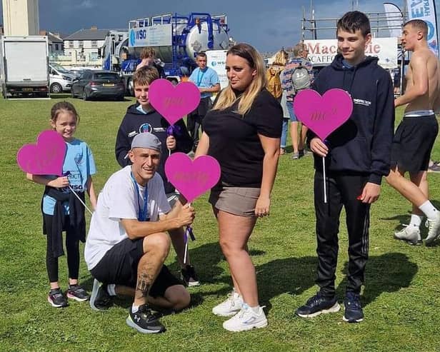 Anthony Wheeler went down on one knee at Sunday's Miles For Men fun run in Seaton Carew to propose to partner Kirsty Jeffries with the help of her children Chloe, Leo and Alfie.