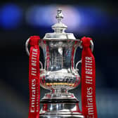 LEICESTER, ENGLAND - MARCH 21: A detailed view of the Emirates FA Cup Trophy is seen prior to the Emirates FA Cup Quarter Final  match between Leicester City and Manchester United at The King Power Stadium on March 21, 2021 in Leicester, England. Sporting stadiums around the UK remain under strict restrictions due to the Coronavirus Pandemic as Government social distancing laws prohibit fans inside venues resulting in games being played behind closed doors.  (Photo by Alex Pantling/Getty Images)