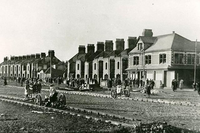 The damage to Cleveland Road can be clearly seen in this photo. Children used burnt out rolling stock as play items in the foreground. Photo: Hartlepool Museum Service.