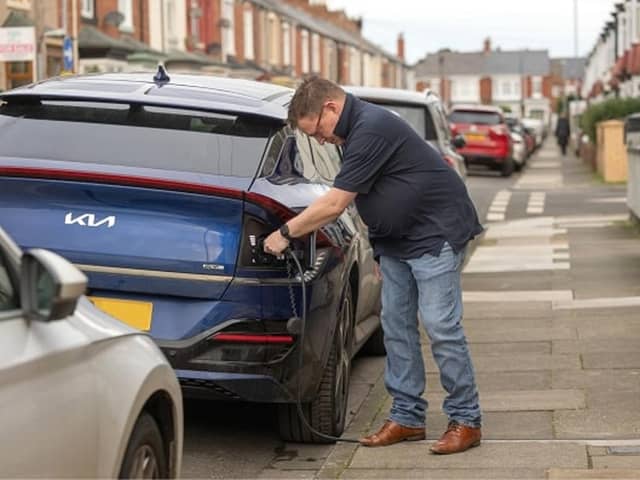 Hartlepool resident James Pratt charges his electric car using a Kerbo Charge.