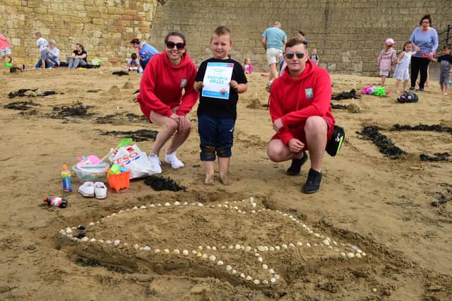 Community events including a Sand Design competition are set to return in 2021 by Hartlepool Carnival Committee.
Seen here in 2019 is judges Arron Boagey (right) and Courteney Thompson (left) with 4-9 section runner up Jackson Cawley aged five.
