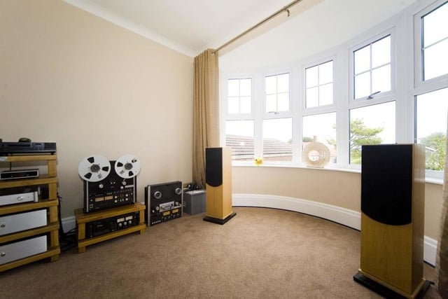 The music room is the perfect space to entertain family and friends.