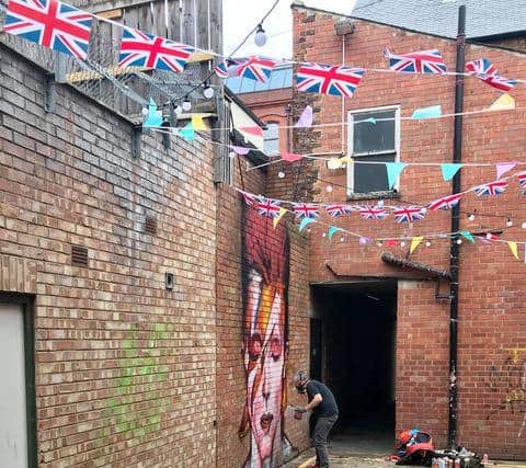David Bowie mural painted for Idol's 'beer alley'.
