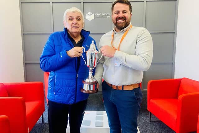 Sunday League Chairman (left) and Orangebox CEO Simon Corbett with the new Hartlepool Sunday League Champions League Trophy.