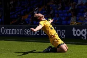 Rhys Oates of Hartlepool United celebrates after scoring his team's first goal during the Vanarama National League Play-Off Semi Final match between Stockport County and Hartlepool at Edgeley Park on June 13, 2021 in Stockport, England. (Photo by Charlotte Tattersall/Getty Images)