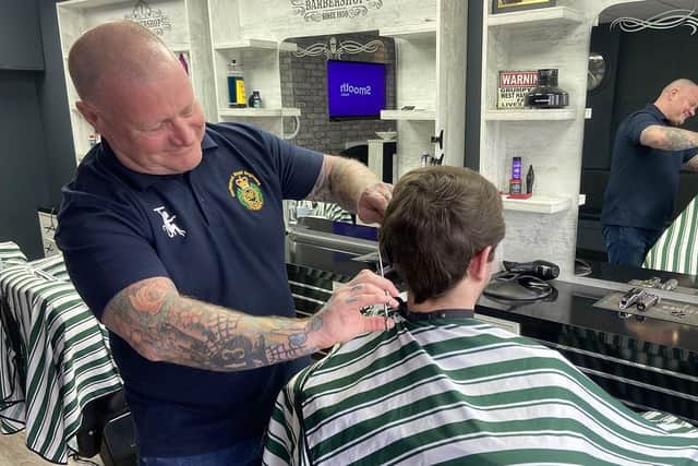 Ronnie Eve gets to work at his day job at The Barber Shop, in Owton Manor Lane, Hartlepool.