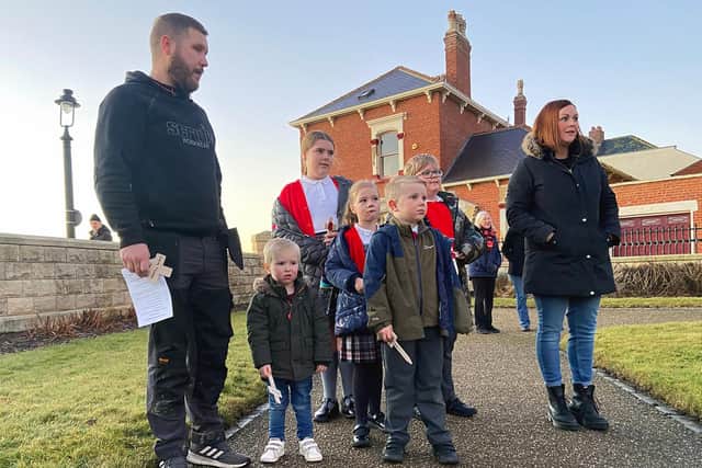 Parents and children from St Helen's Primary School attending the service held at the Redheugh Gardens. Picture by FRANK REID