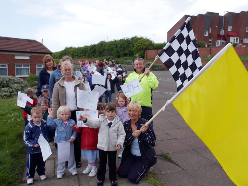 Downhill Infants School pupils were in the picture in this special walk in 2005. Is there someone you know in the photo?