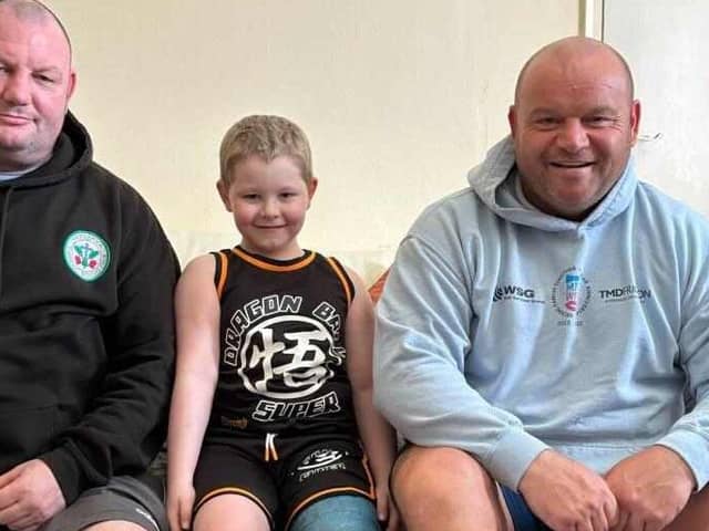 James Rooney of Hartlepool Catholic Boxing Club and Micky Day of Miles For Men who will lead a walk up Scafell Pike for Riley Bains (centre).
