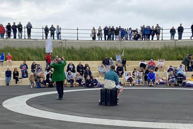 The audience are entertained by a circus performer at the newly opened Elephant Rock event space during the Queen's Jubilee celebrations on the Headland. Picture by FRANk REID