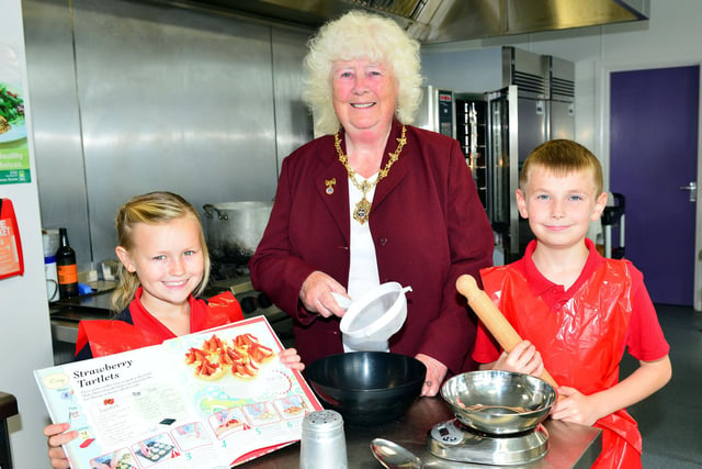 Rift House Primary School pupils Paris Boyd and Joshua Jenkins-Halcrow baked cakes with The Deputy Mayor of Hartlepool, Coun Mary Fleet, in 2014.