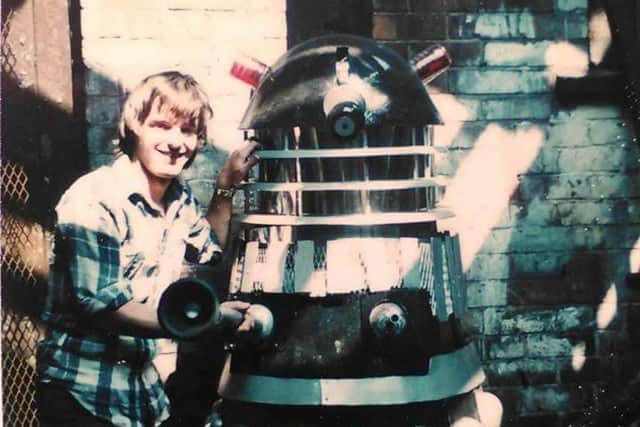 A younger Paul Bianco with one of his own model Daleks.