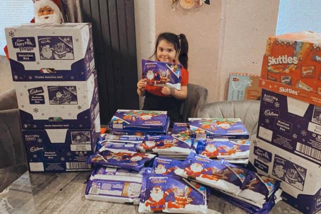 Lyla O'Donovan with just some of the selection boxes she is organising for poorly children in hospital.
