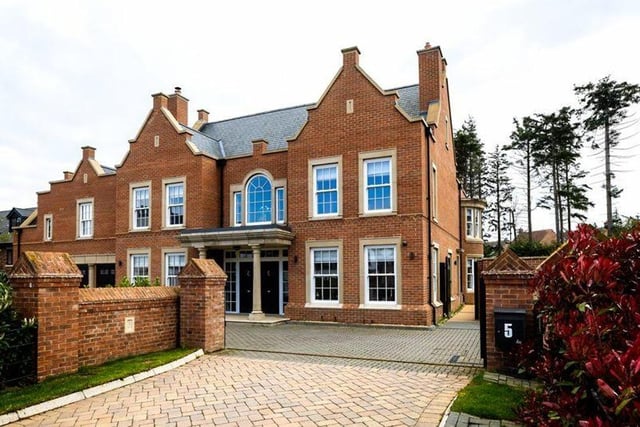 This detached six-bed home is a self-build, hidden in a prestigious and private gated development. This home is currently on the market and accepting offers over £2.3 million.