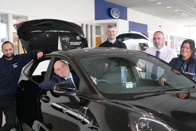 Simon Sumner, general manager of Bristol Street Motors Hartlepool, with colleagues.