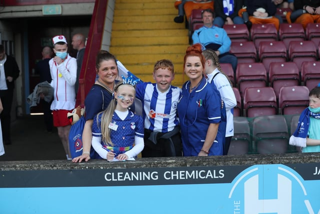 Hartlepool United supporters make more memories as part of their end of season fancy dress tradition at Scunthorpe (Credit: Mark Fletcher | MI News)