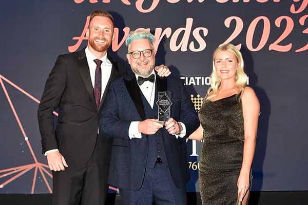 Hartlepool's Mark Lloyd (centre) collecting his award at the UK Jewellery Awards.