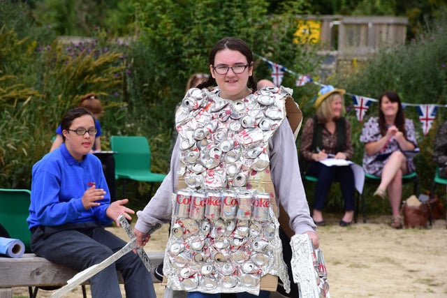 This student used recycled Diet Coke cans to create an impressive outfit.