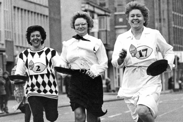 Competitors in the Mail Pancake Race set off along Victoria Road in 1989.