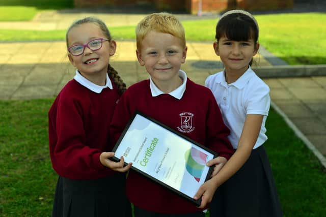 West View Primary School pupils (left to right) Emily Carter, Jac Maddison and Floudia Ikonomi with International School award certificate.