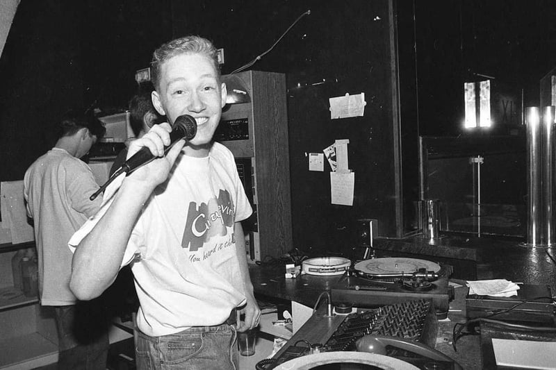 A young DJ spinning some tunes.