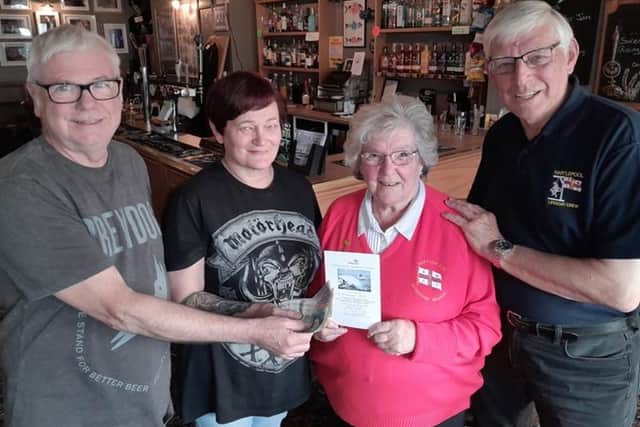 Anne Wray and Malcolm Cook from Hartlepool RNLI are presented with the money raised by Glenn Murphy and Hazel Whitelock of the Fishermans Arms./Photo: RNLI/Tom Collins