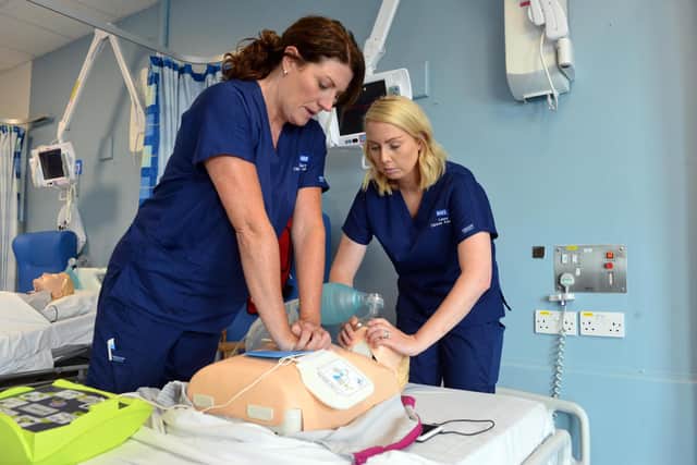 Claire Palmer and Laura Dring demonstrate how to do CPR in the University Hospital of Hartlepool's new clinical skills laboratory.