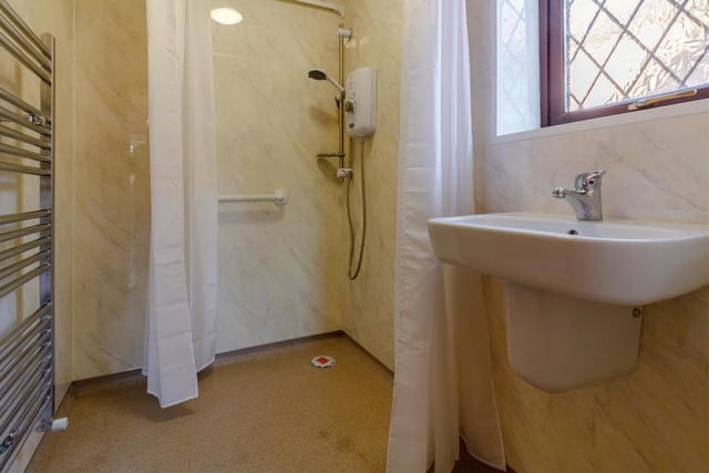 The master bedroom has its own en suite wet room, which includes a walk-in shower. There is also a wall-hung wash hand basin with chrome mixer tap and a chrome, heated towel-rail.