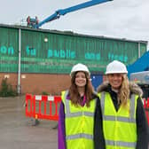 Left to right: Councillor Shane Moore, Bev Bearne and Amy Waller, the Council’s Principal Housing Officer (Place) watch the start of demolition on the former depot in Lynn Street.